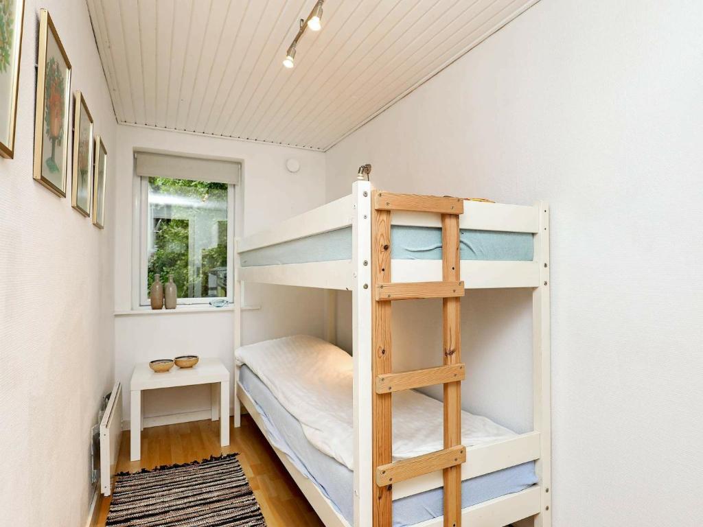Postel nebo postele na pokoji v ubytování 4 person holiday home in Nykøbing M-By Traum
