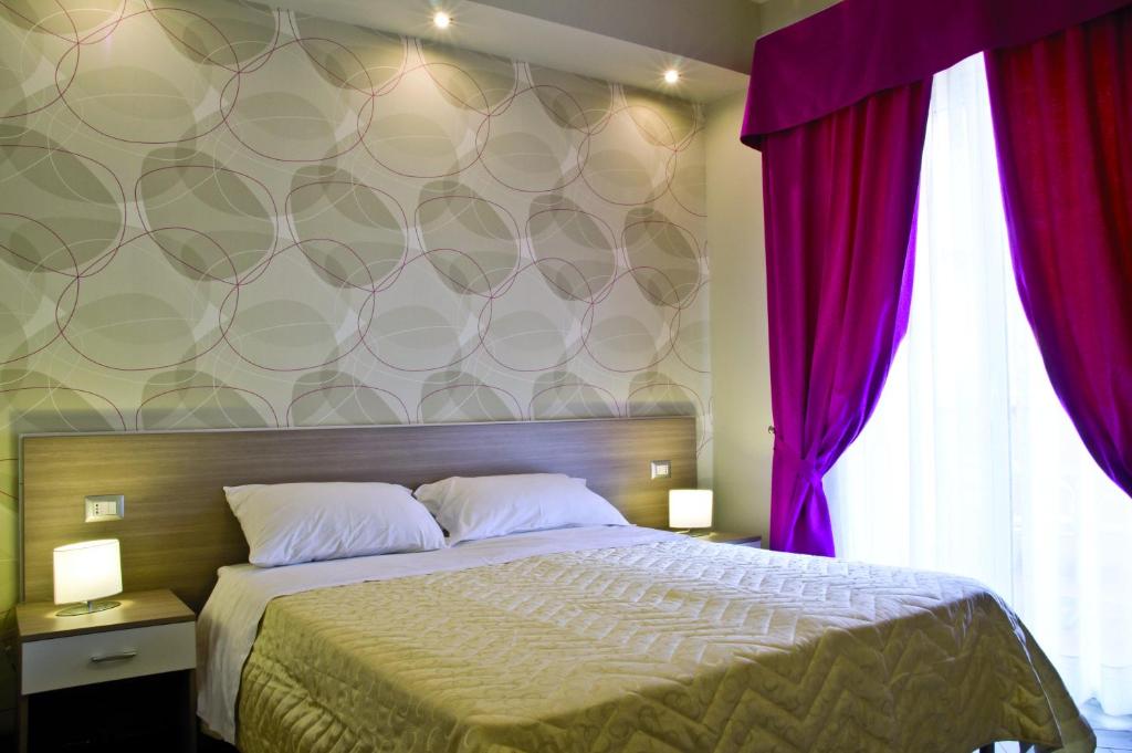 Postel nebo postele na pokoji v ubytování B&B Albachiara