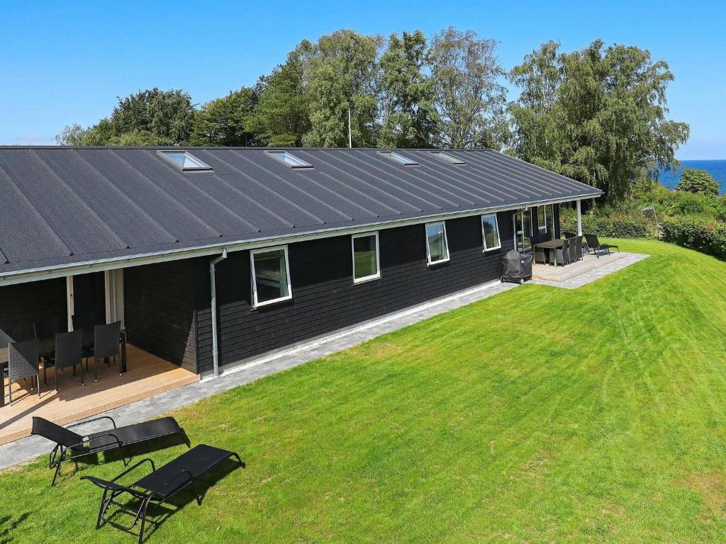 an aerial view of a house with a large yard at 16 person holiday home in Alling bro in Rygård Strand