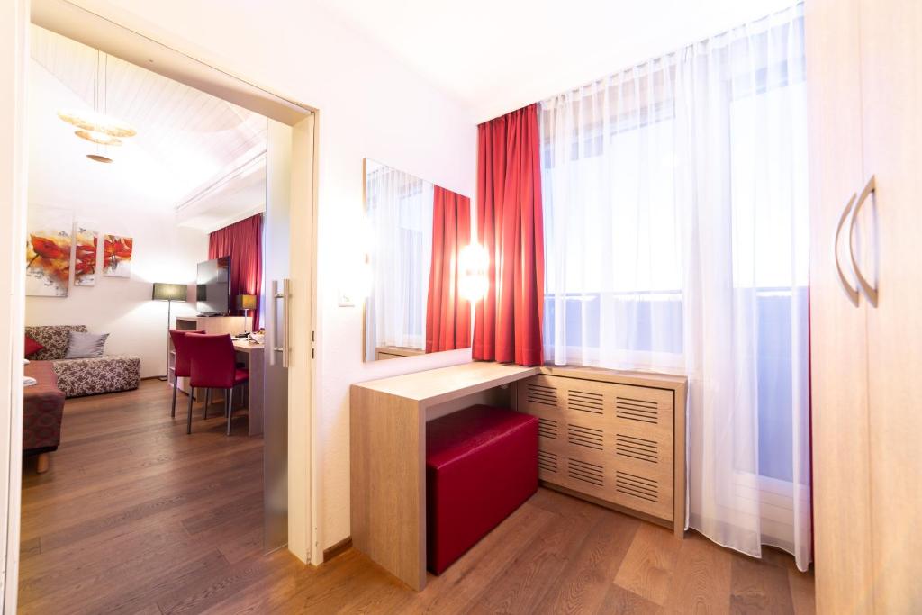 Postel nebo postele na pokoji v ubytování Hotel Alexander