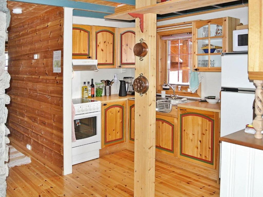 Kuchyň nebo kuchyňský kout v ubytování 11 person holiday home in Edland