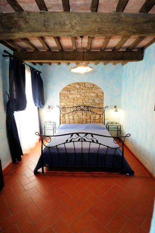 Posteľ alebo postele v izbe v ubytovaní Agriturismo I Monti