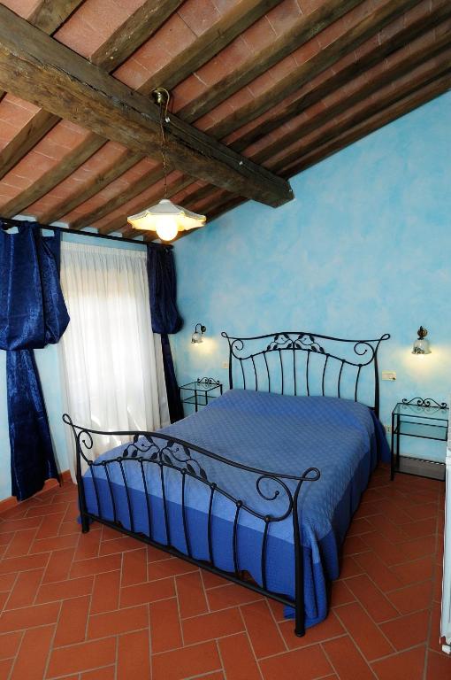Posteľ alebo postele v izbe v ubytovaní Agriturismo I Monti