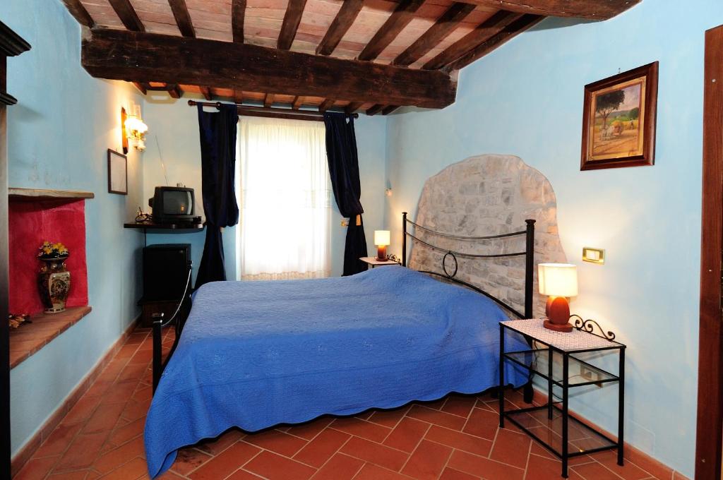 Posteľ alebo postele v izbe v ubytovaní Agriturismo I Monti