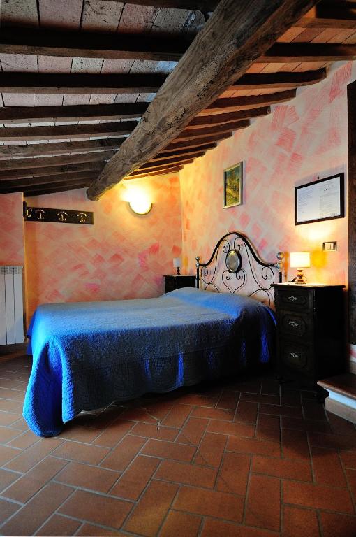 Posteľ alebo postele v izbe v ubytovaní Agriturismo I Monti