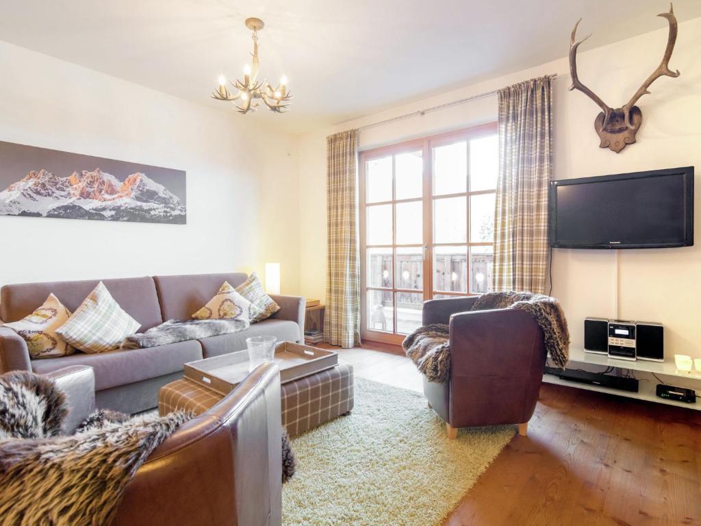 TV a/nebo společenská místnost v ubytování Holiday home with snow covered views