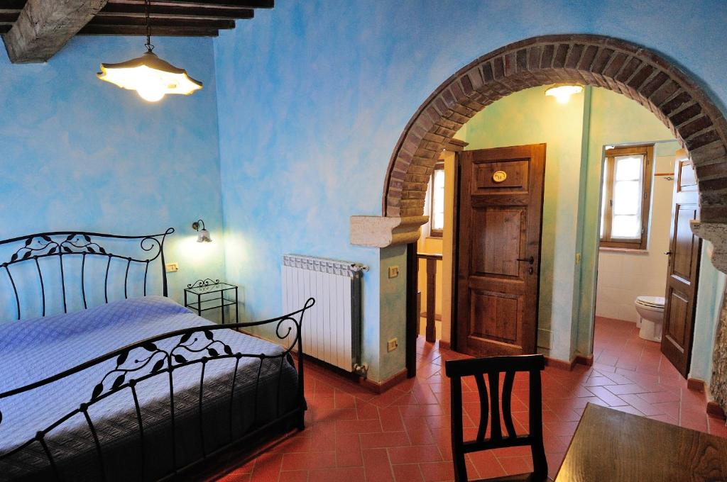 Posteľ alebo postele v izbe v ubytovaní Agriturismo I Monti