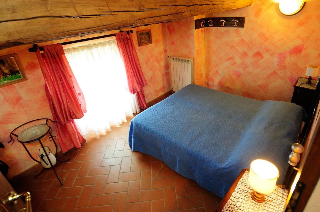 Posteľ alebo postele v izbe v ubytovaní Agriturismo I Monti