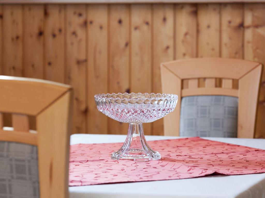 a glass bowl sitting on top of a table at Apartment in Armsfeld with heated outdoor pool in Bergfreiheit