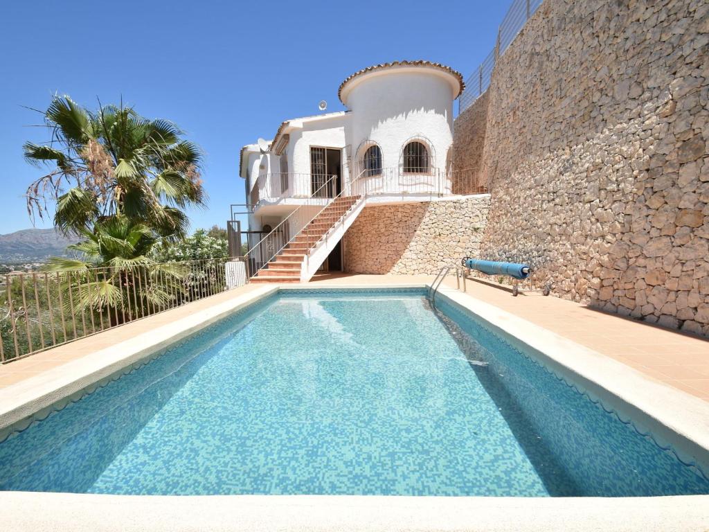 The swimming pool at or close to Villa with private pool in Benitachell