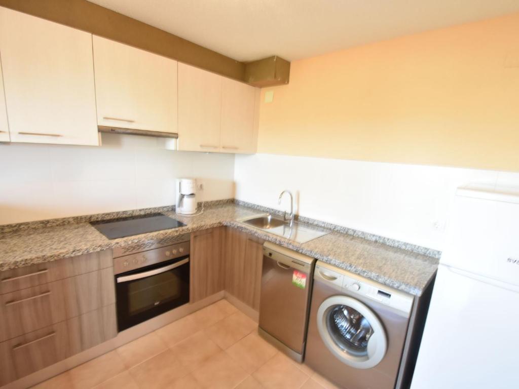 A kitchen or kitchenette at Villa with private pool in Benitachell