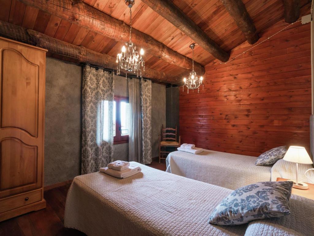 Postel nebo postele na pokoji v ubytování Belvilla by OYO Casa Espunyes Plata