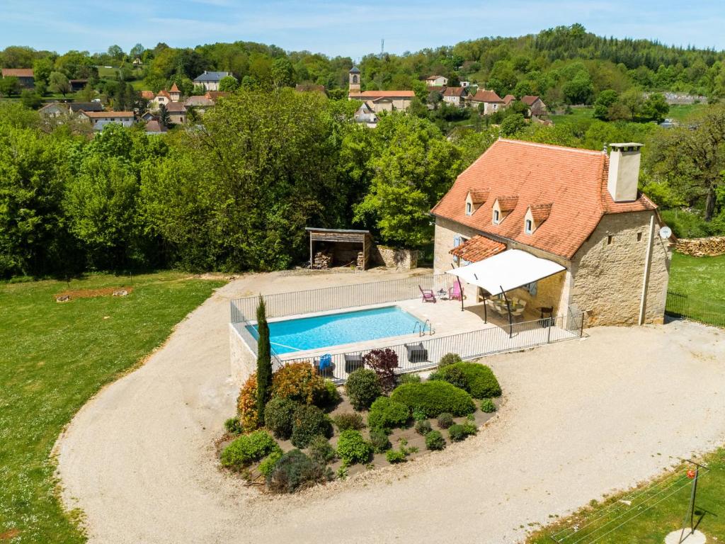 an overhead view of a house with a swimming pool at Holiday Home in Th mines with Private Pool in Issendolus