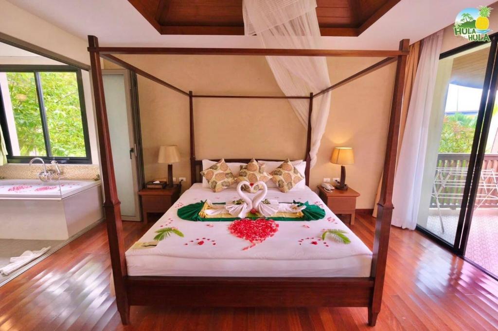 Postel nebo postele na pokoji v ubytování Hula Hula Resort, Ao Nang