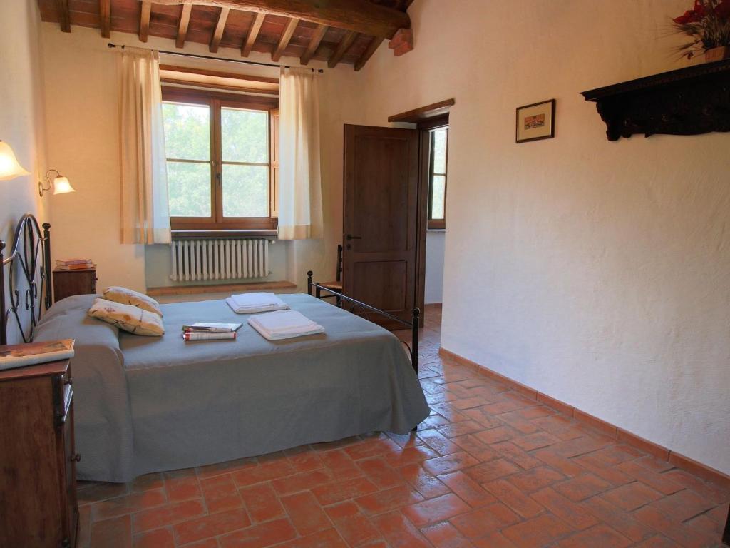 A bed or beds in a room at Farmhouse in Proceno with Pool and Terrace