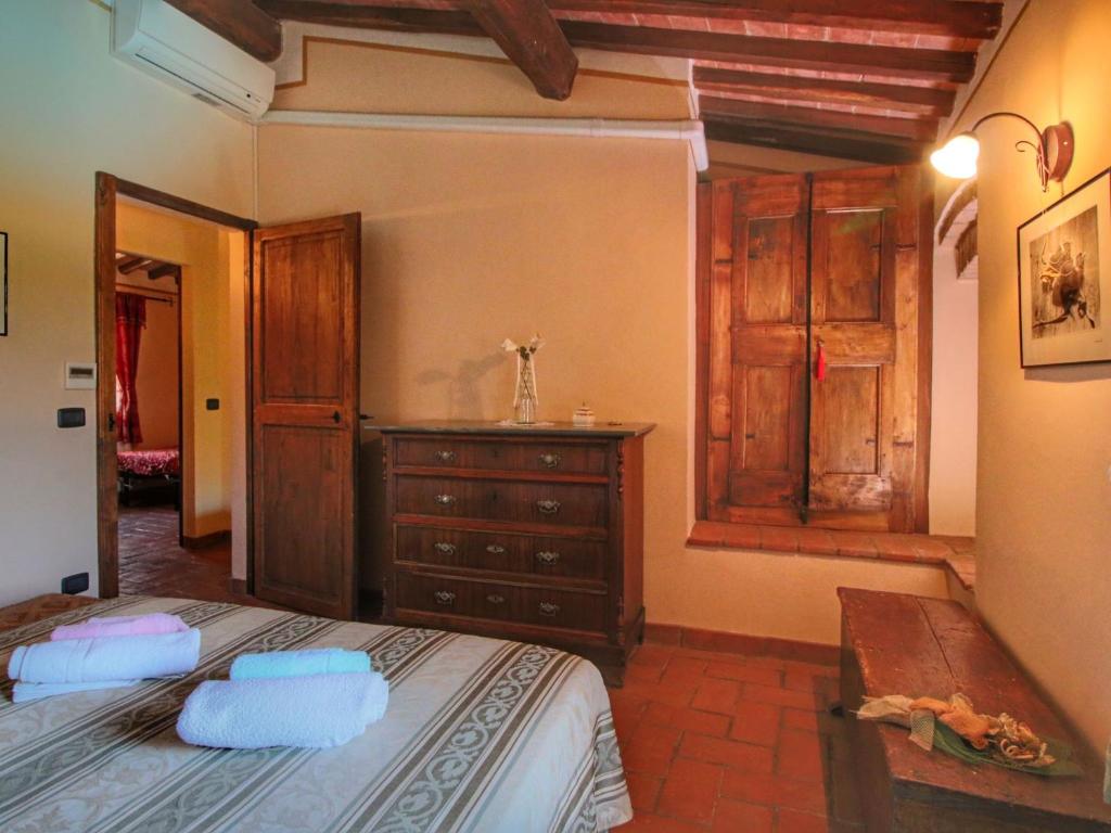 Posteľ alebo postele v izbe v ubytovaní Elegant Apartment Retreat in Todi