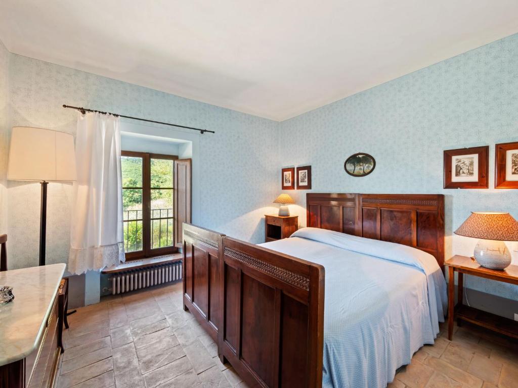 Łóżko lub łóżka w pokoju w obiekcie Belvilla by OYO Locanda le Querce
