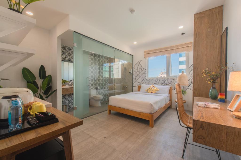 Postel nebo postele na pokoji v ubytování Shoho Hotel Nha Trang