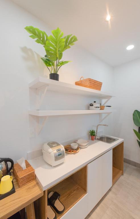 Kuchyň nebo kuchyňský kout v ubytování Shoho Hotel Nha Trang