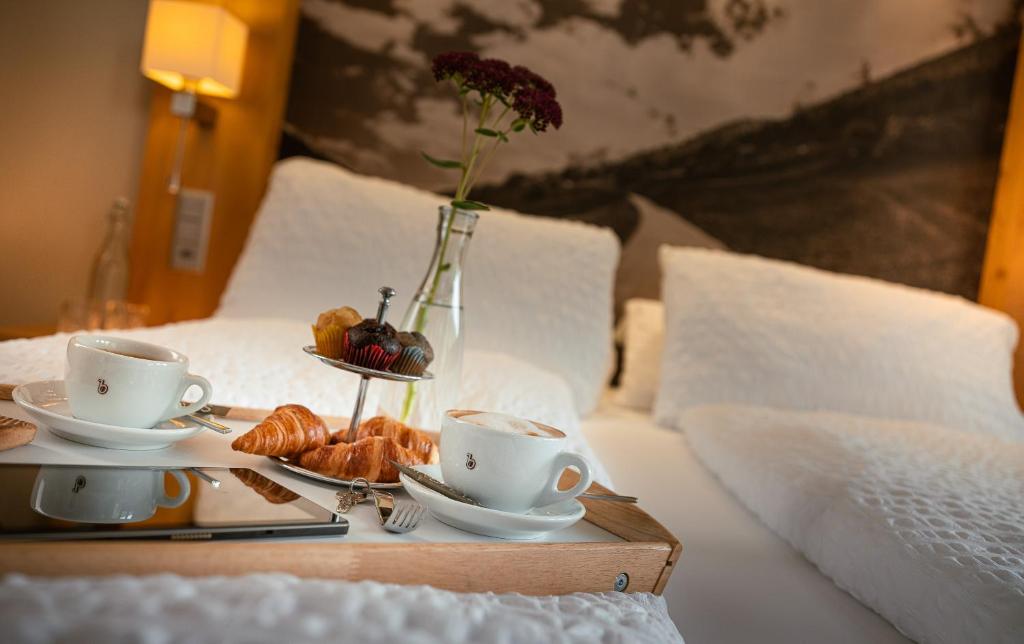 Postel nebo postele na pokoji v ubytování Hotel Landhaus