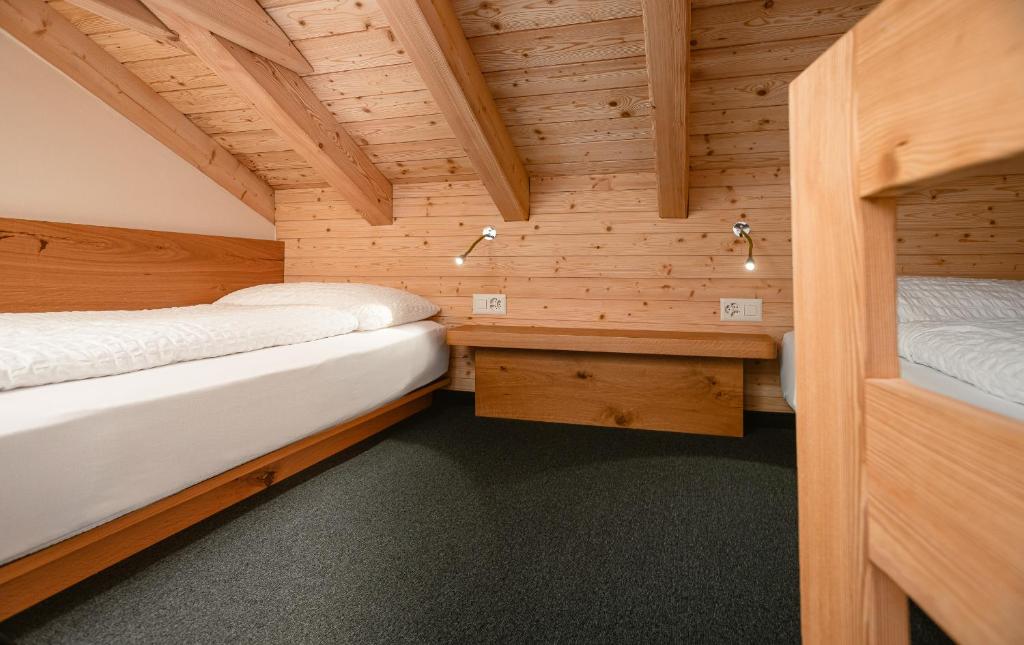 Postel nebo postele na pokoji v ubytování Hotel Landhaus