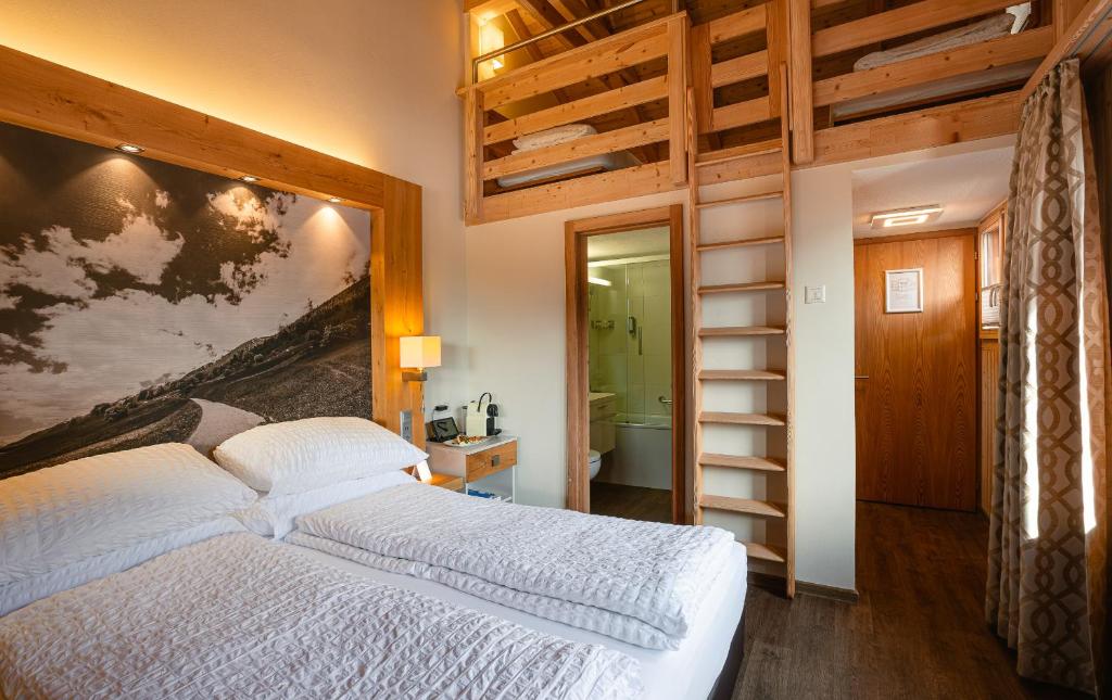 Postel nebo postele na pokoji v ubytování Hotel Landhaus
