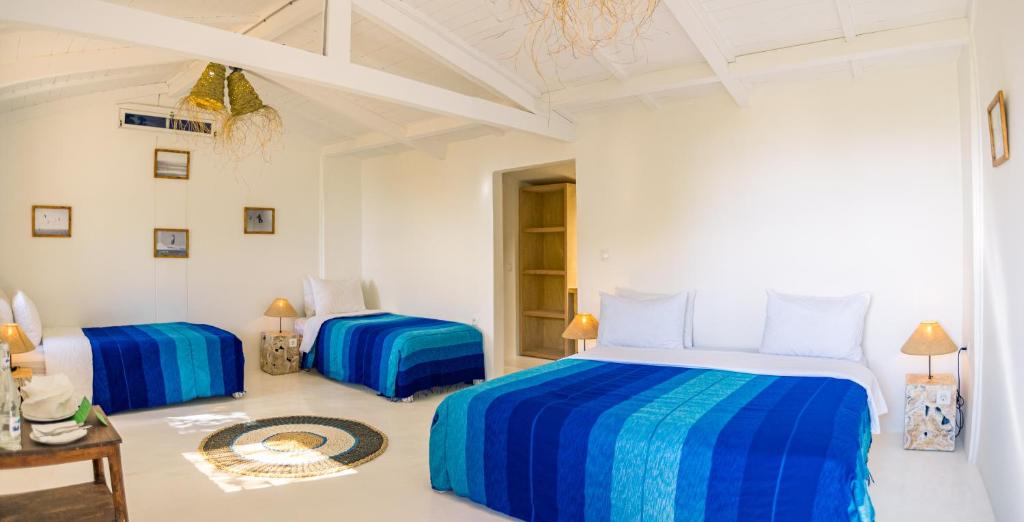 Una cama o camas en una habitación de Dakhla Attitude