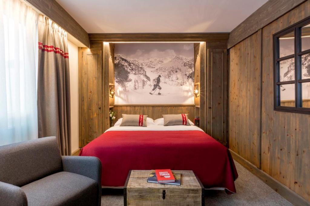 Postel nebo postele na pokoji v ubytování Edelweiss Manotel