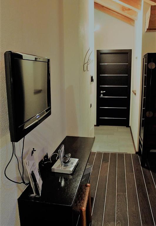 Televízia a/alebo spoločenská miestnosť v ubytovaní Hotel Nordend