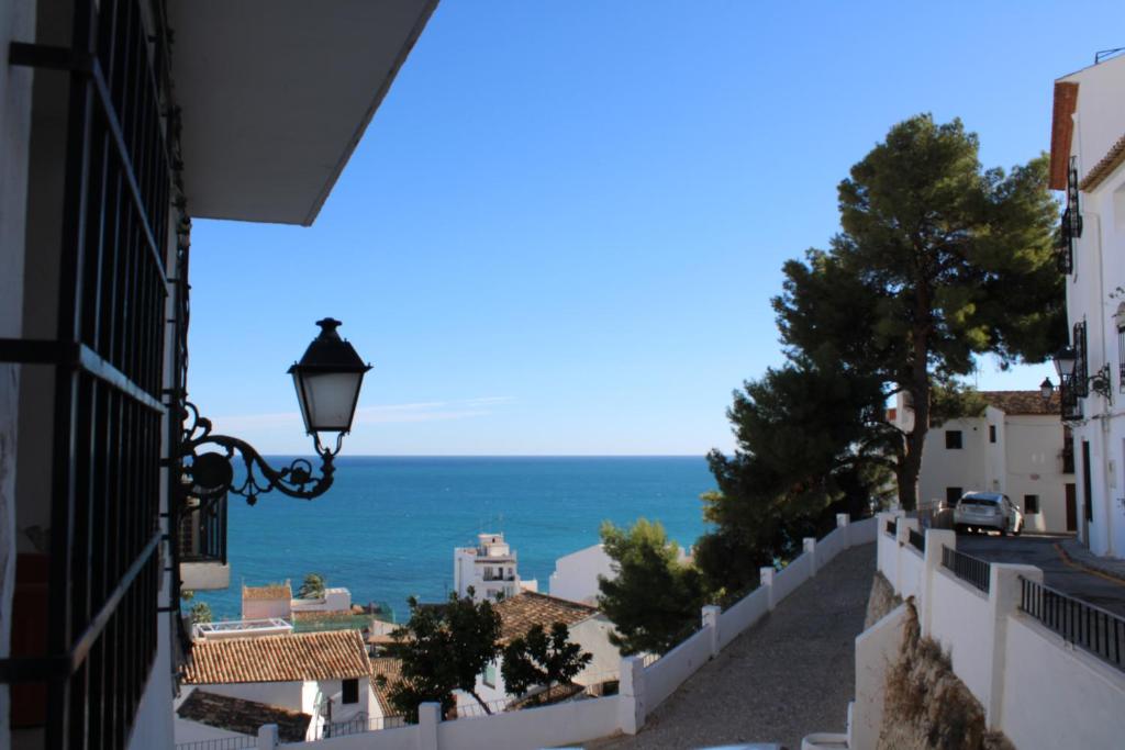 a view of the ocean from a building at Hostal Fornet Altea in Altea
