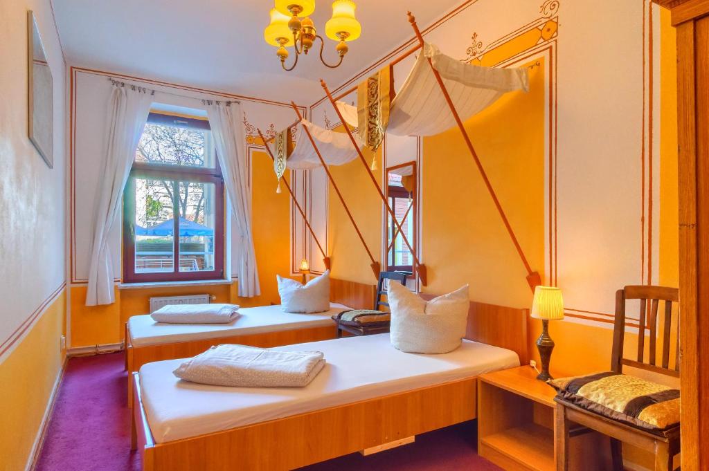 Postel nebo postele na pokoji v ubytování Hostel Lollis Homestay Dresden