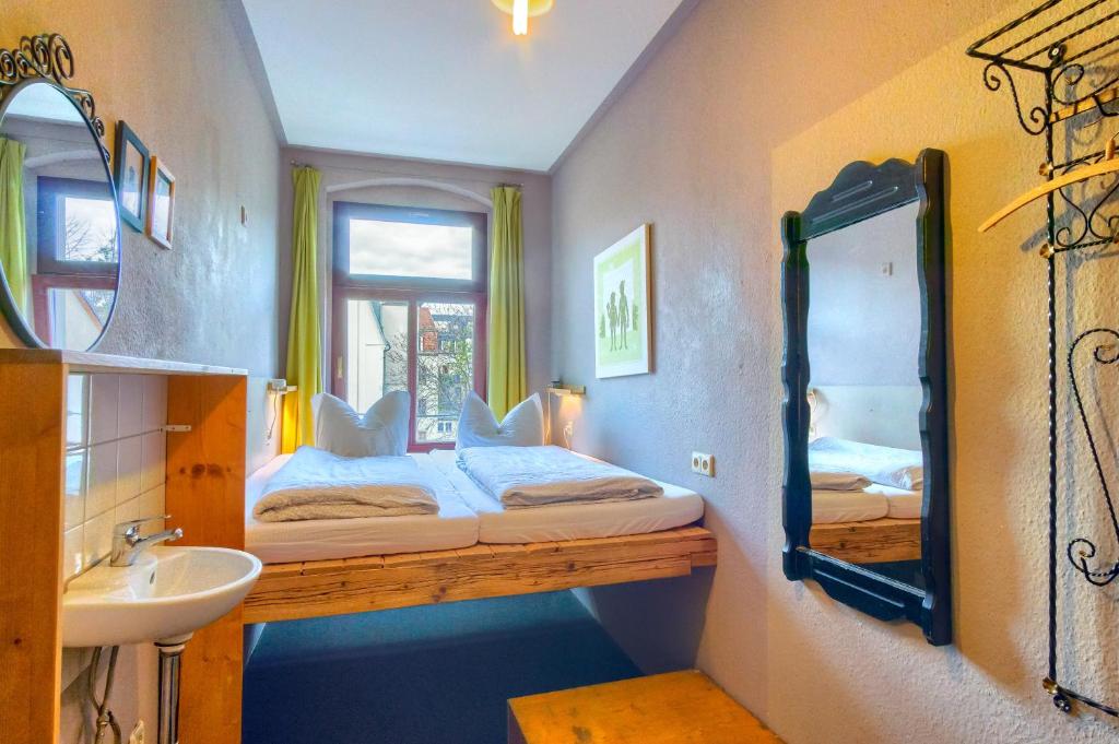 Postel nebo postele na pokoji v ubytování Hostel Lollis Homestay Dresden