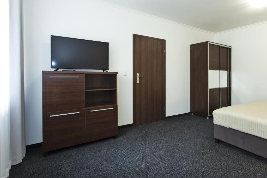 Postel nebo postele na pokoji v ubytování InterHotel