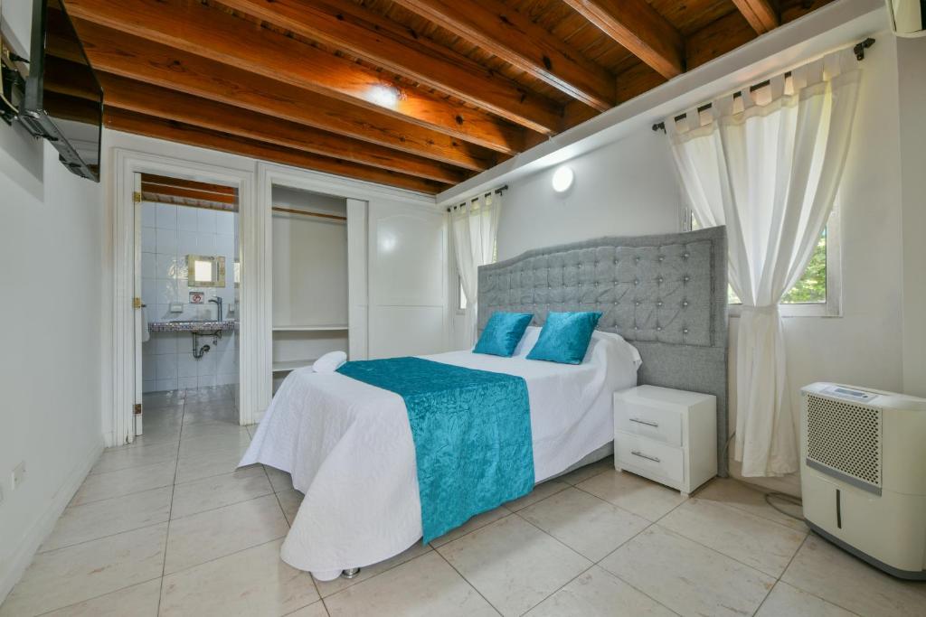 Postel nebo postele na pokoji v ubytování APARTAMENTOS TT9