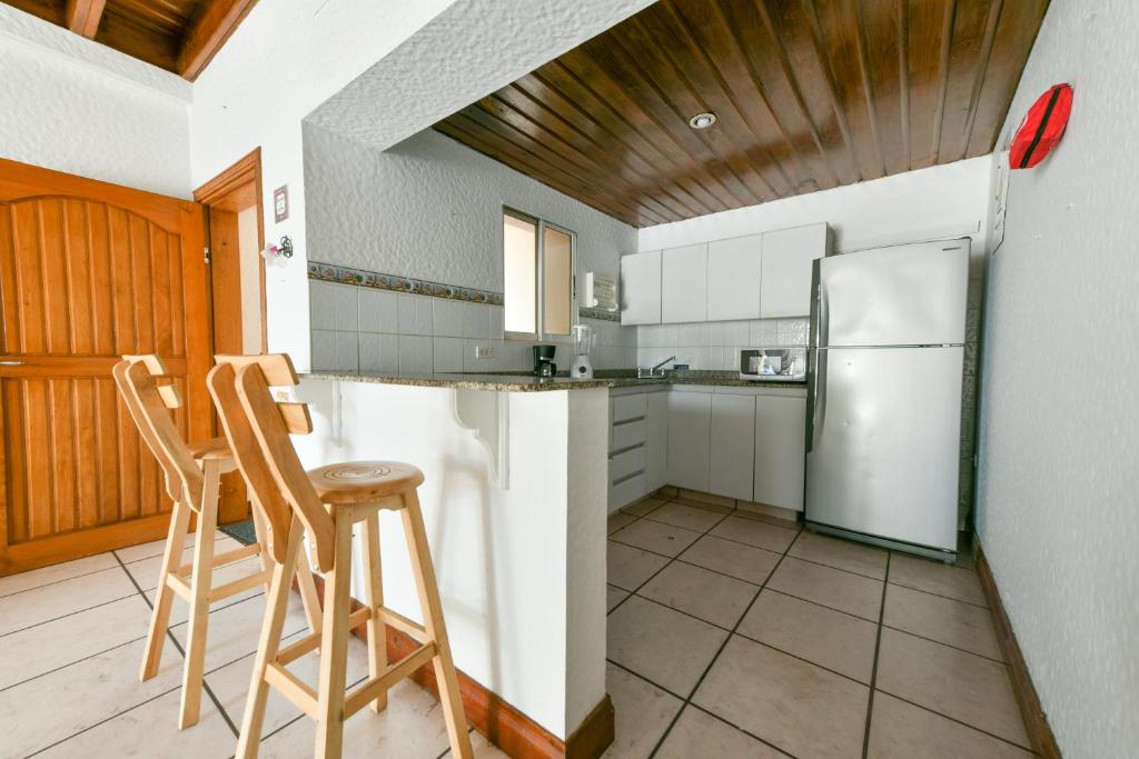 Kuchyň nebo kuchyňský kout v ubytování APARTAMENTOS TT9