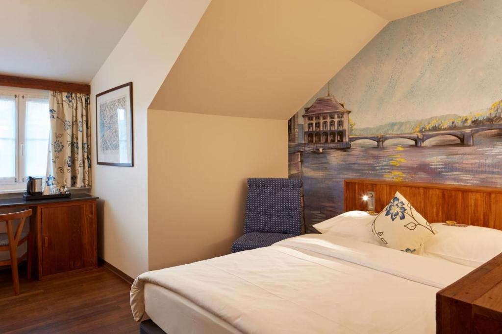 Hotel Adler Zürichにあるベッド