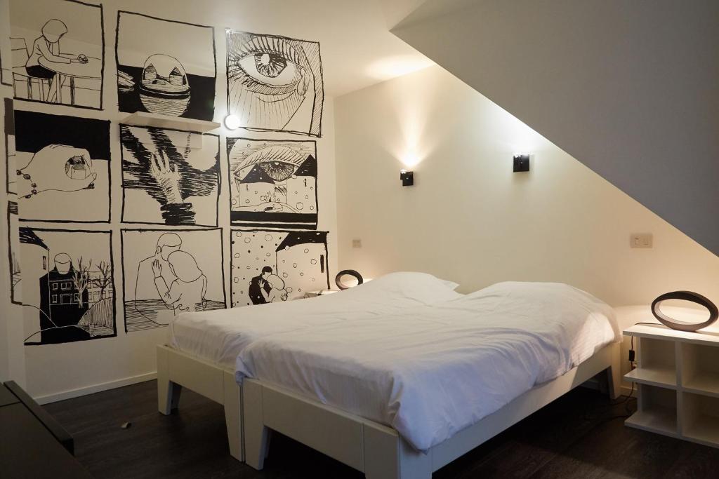 Postel nebo postele na pokoji v ubytování Focus Hotel