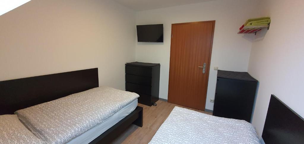 Postel nebo postele na pokoji v ubytování Apartment Marx
