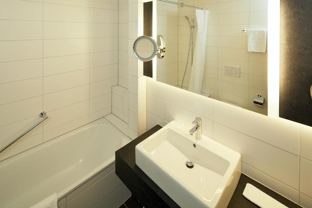 Koupelna v ubytování Hotel Laaxerhof