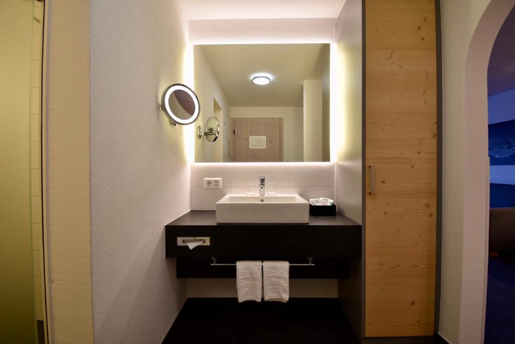 Koupelna v ubytování Hotel Laaxerhof