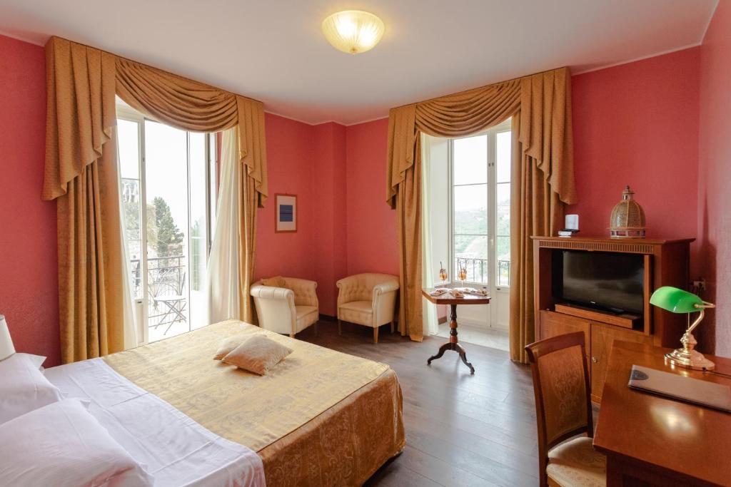 Posteľ alebo postele v izbe v ubytovaní Excelsior Palace Hotel