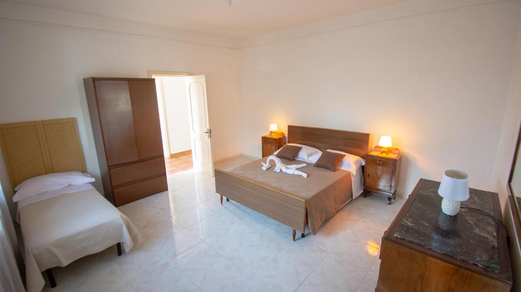 Кровать или кровати в номере VILLA SALINA MONACI