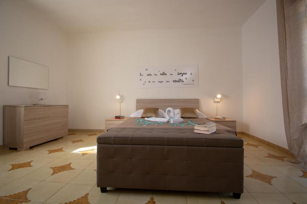 Кровать или кровати в номере VILLA SALINA MONACI
