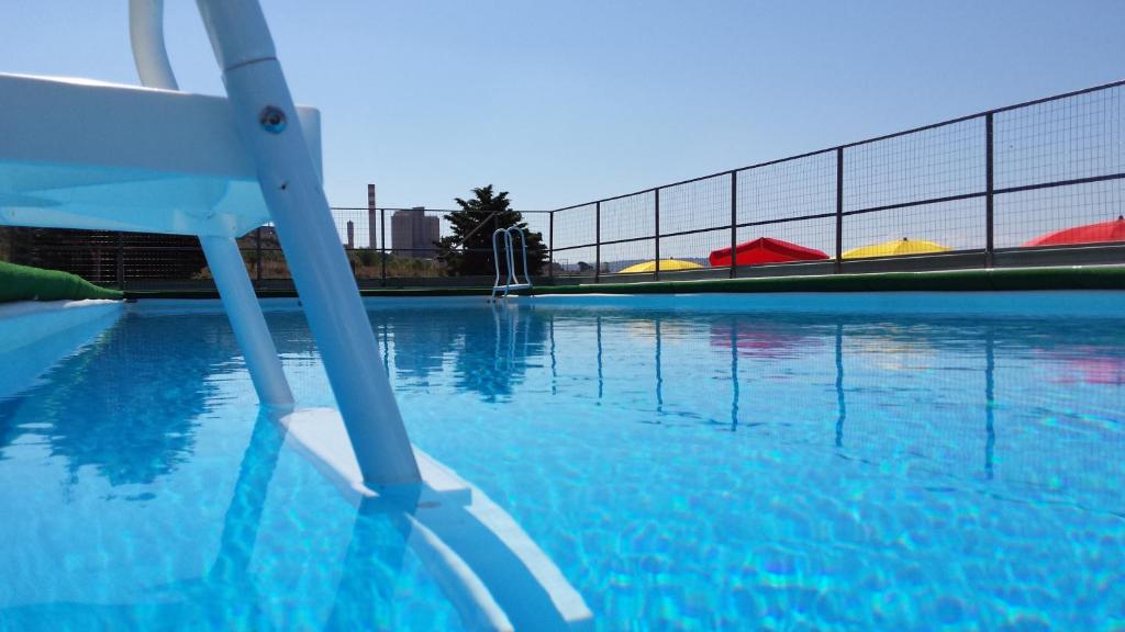 een gesloten zwembad bij Zio Mario e Zia Maria - Casa Vacanze e Affitti brevi in Castrovillari
