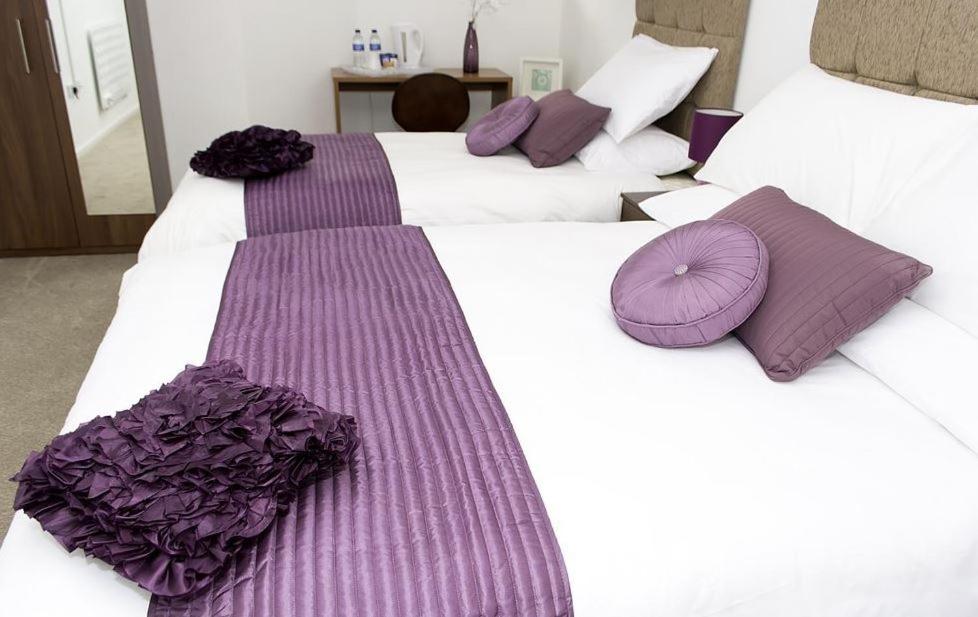 Postel nebo postele na pokoji v ubytování Parkview Residence