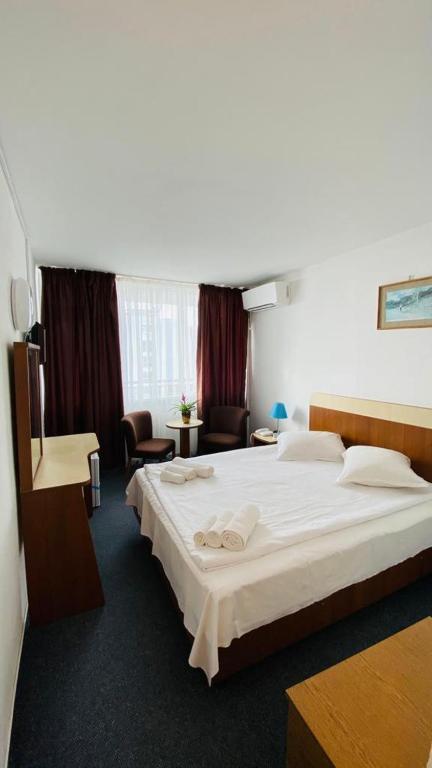 Postel nebo postele na pokoji v ubytování Hotel Neko