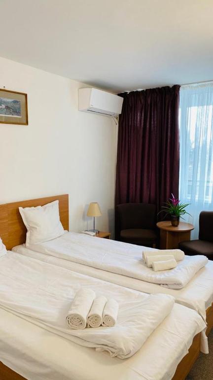 Postel nebo postele na pokoji v ubytování Hotel Neko