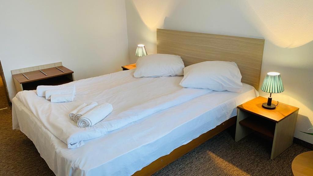 Postel nebo postele na pokoji v ubytování Hotel Neko