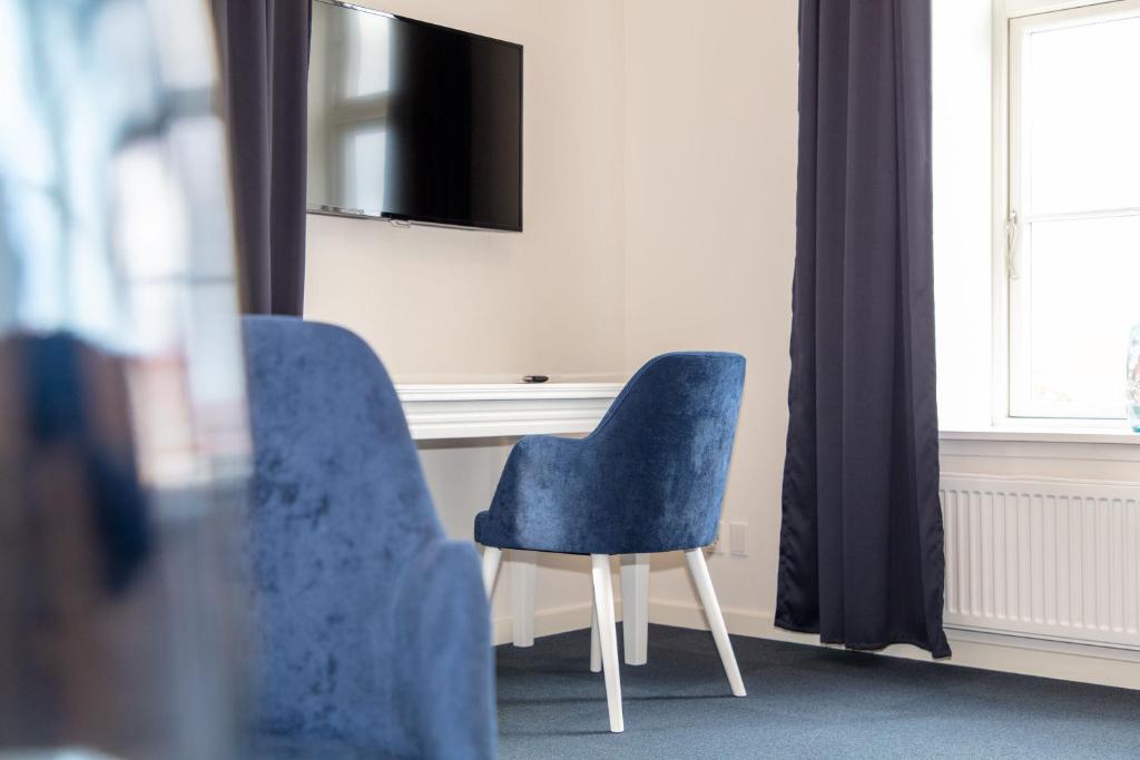 TV a/nebo společenská místnost v ubytování Skagen Hotel