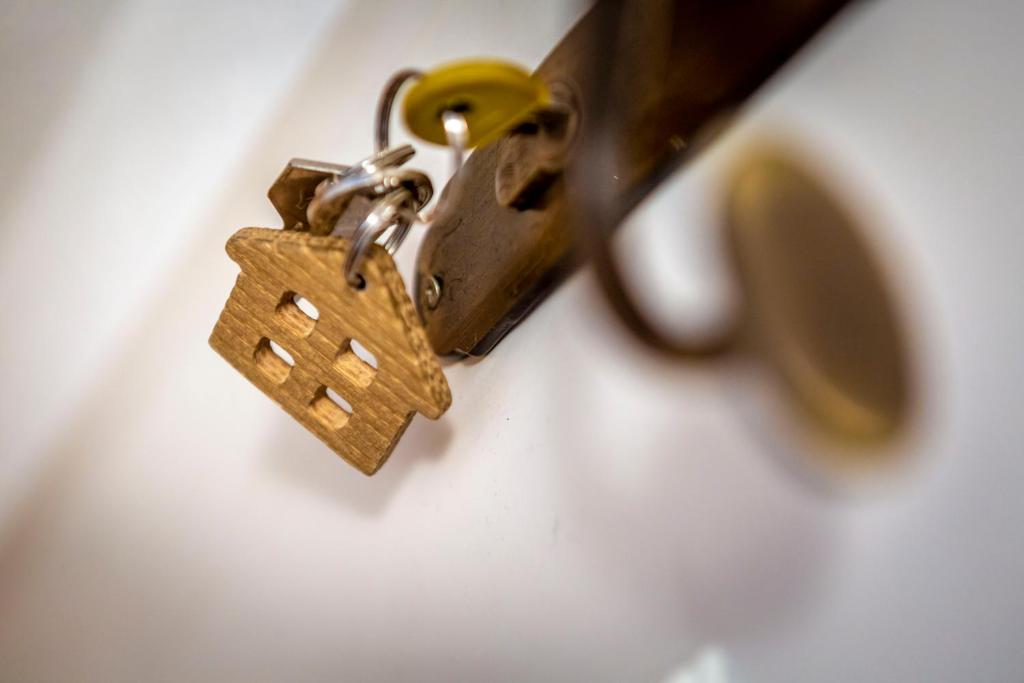 a close up of a key chain with a house on it at Valle Maura in Canazei